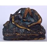 A FRENCH BRONZE STATUE OF TWO WOMAN, modelled performing an act of love. 11 cm wide.