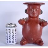 A SOUTH AMERICAN MEXICAN POTTERY FIGURAL VASE. 25 cm high.