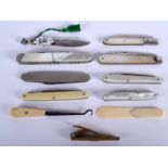 A COLLECTION OF MINIATURE KNIVES some with silver blades. (11)