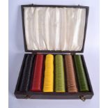 A CASED SET OF BAKELITE GAMING COUNTERS. (qty)