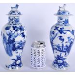 A PAIR OF 19TH CENTURY CHINESE BLUE AND WHITE VASES AND COVERS Qing. 28 cm high.
