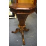 A VICTORIAN SEWING BOX ON STAND, formed with carved floral splayed legs. 70 cm x 39.5 cm.