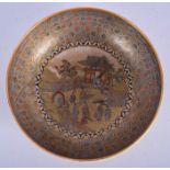 A 19TH CENTURY JAPANESE MEIJI PERIOD SATSUMA POTTERY BOWL painted with figures within landscapes. 1