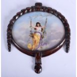 AN UNUSUAL 19TH CENTURY CONTINENTAL PORCELAIN PLAQUE painted with a female swinging upon a chair. P