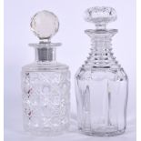 AN ANTIQUE IRISH GLASS DECANTER, together with a “hob nail” cut decanter. 22 cm & 21 cm. (2)