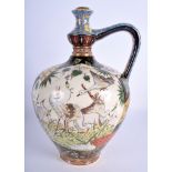 A RARE ARTS AND CRAFTS HUNGARIAN FISCHER BUDAPEST EWER JUG decorated with birds and landscapes. 28