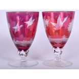 A PAIR OF EARLY 20TH CENTURY BOHEMIAN GLASS GOBLETS, engraved with geese in flight. 11.5 cm high.
