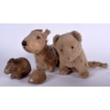 AN ANTIQUE STUFFED TOY DOG, together with a cat and two others. Largest 27 cm long. (4)