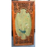 A CHINESE LACQUER PANEL, contained within a wooden frame. 69 cm x 32 cm.