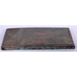 AN EARLY ISLAMIC BRONZE BASE OR STAND, rectangular in form. 28.5 cm wide.