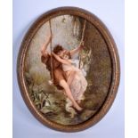 A VERY RARE 19TH CENTURY DOUBLE SIDED PORCELAIN PLAQUE painted with neo classical lovers upon a swi