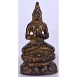 A CHINESE BRONZE BUDDHA, modelled seated upon a double lotus base. 8 cm high.