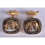 A RARE PAIR OF RUSSIAN 14CT GOLD AND DIAMOND BEAR & ELEPHANT CUFFLINKS. 11.5 grams.