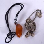 A CHINESE WHITE METAL BOTTLE PENDANT, together with an amber type pendant. Pendant 4.5 cm long. (2)