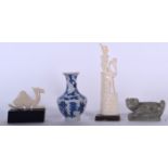 A CHINESE BLUE AND WHITE PORCELAIN VASE, together with two carvings and a soapstone figure. (4)