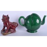 A RARE CHINESE GREEN GLAZED CADOGAN TEAPOT together with a flambé stoneware lion. 20 cm & 11 cm wid