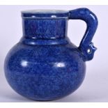 A 20TH CENTURY CHINESE BLUE GLAZED PORCELAIN JUG, Xuande marks to base. 17 cm wide.