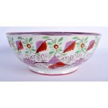 A LARGE 19TH CENTURY SUNDERLAND LUSTRE POTTERY BOWL painted with flowers. 25 cm x 11 cm.