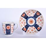 A 18TH CENTURY WORCESTER COFFEE CUP AND SAUCER painted with the Old Japan Star pattern, fretted squ