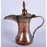 AN EARLY ISLAMIC MIDDLE EASTERN COPPER AND BRASS EWER decorated with foliage and motifs. 28 cm high