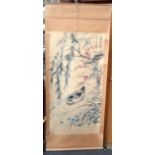 A CHINESE SCROLL PAINTING ON SILK, depicting a bird swimming amongst foliage 135 cm x 67 cm.