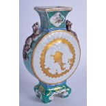 A 19TH CENTURY JAPANESE MEIJI PERIOD KUTANI VASE painted with a dragon. 19 cm high.
