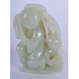 AN EARLY 20TH CENTURY CHINESE CARVED GREEN JADE BOY modelled beside another. 7.5 cm x 4.5 cm.