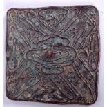 A CHINESE BRONZE HAND MIRROR, decorated in relief with foliage. 11.5 cm wide.