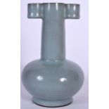 A CHINESE SUNG STYLE PALE BLUE GLAZED PORCELAIN VASE, arrowhead in shape. 19 cm high.