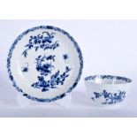 A 18TH CENTURY WORCESTER FEATHER MOULD FLORAL TEA BOWL AND SAUCER painted in blue, workman’s marks.