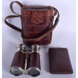 A PAIR OF VINTAGE CROC LEATHER SKIN CASED BINOCULARS together with a small leather case. (2)