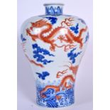 A CHINESE BLUE AND WHITE BALUSTER VASE bearing Qianlong marks to base, painted with dragons. 33 cm