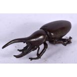 A JAPANESE BRONZE OKIMONO IN THE FORM A LONGHORN BEETLE, signed. 8 cm wide.