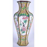 A 19TH CENTURY CHINESE CANTON ENAMEL VASE Qing, painted with birds and foliage. 27 cm high.