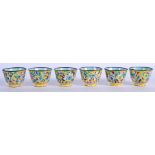 SIX 19TH CENTURY CHINESE CANTON ENAMEL TEA BOWLS Qing. 4.75 cm wide. (6)