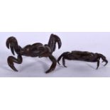 A JAPANESE TAISHO PERIOD BRONZE OKIMONO IN THE FORM OF A CRAB, together with a smaller example. Lar