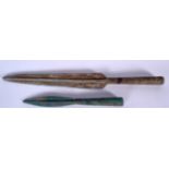 AN ISLAMIC SPEAR TIP, together with a smaller example. Largest 41.5 cm. (2)