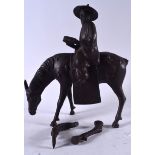 A LARGE CHINESE METAL FIGURE OF A MALE ON HORSEBACK, the removable male formed reading a book. 49 c