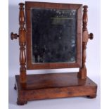 AN 18TH CENTURY CARVED YEW WOOD MIRROR upon a rectangular base. 32 cm x 40 cm.