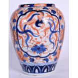 A JAPANESE MEIJI PERIOD IMARI PORCELAIN BALUSTER VASE, painted with mythical creatures and foliage.
