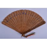 A 19TH CENTURY CHINESE CARVED SANDALWOOD FAN Qing. 48 cm wide.