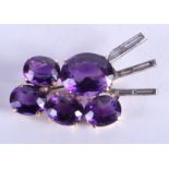 A GOLD AMETHYST AND DIAMOND BROOCH. 8.5 grams. 3.75 cm x 2.5 cm.