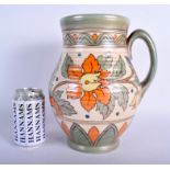 A LARGE ART DECO CROWN DUCAL POTTERY JUG by Charlotte Rhead. 27 cm high.
