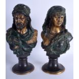 A PAIR OF CONTEMPORARY COLD PAINTED BRONZE FIGURES modelled as a male and female in Arabian dress.