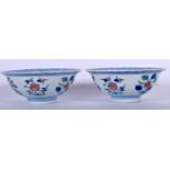 A PAIR OF CHINESE DOUCAI PORCELAIN BOWLS BEARING YONGZHENG MARKS, decorated with foliage. 15 cm wid