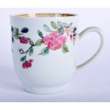 A 18TH CENTURY LIVERPOOL CHAFFERS FACTORY COFFEE CUP painted with flowers and a yellow inner border