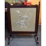 AN EARLY 20TH CENTURY CHINESE SILK EMBROIDERED SCREEN, depicting a dragon in pursuit of the flaming