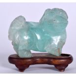 AN EARLY 20TH CENTURY CHINESE CARVED FLUORITE STATUE OF A MYTHICAL BEAST, together with fitted hard