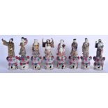 A GROUP OF EIGHT 19TH CENTURY CHINESE FAMILLE ROSE IMMORTALS. Largest 23 cm high. (8)