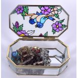 A GROUP OF COSTUME JEWELLERY, contained within a glass box painted with birds. Box 15.5 cm wide.